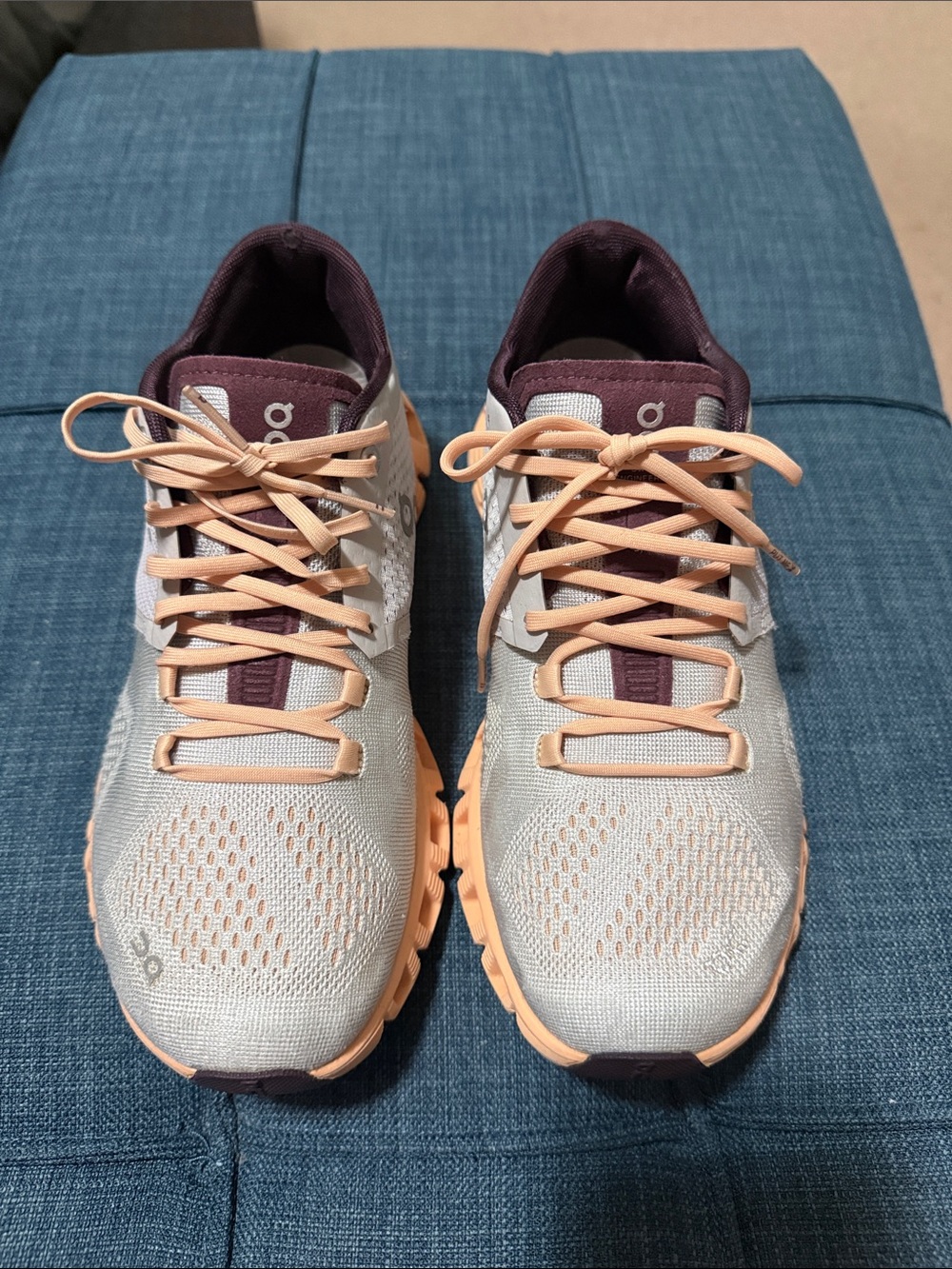 On Running Women's Athletic Shoes in Cream, Peach & Plum.